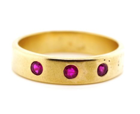 Ruby set 9ct yellow gold ring with a brushed finish marked 375. Approx weight 4.36 grams, ring size Q