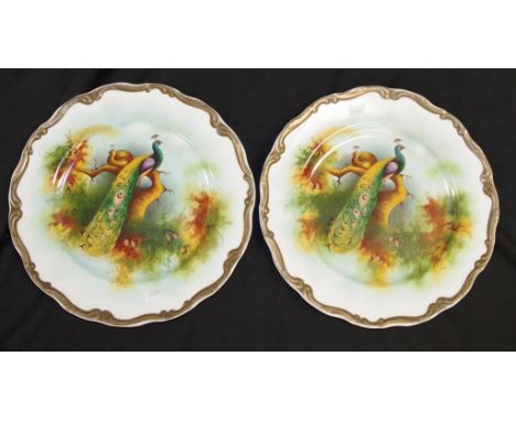 Pair vintage Coalport hand painted display plates each depicting a Peacock, marked to base, gilt border, (diameter 26cm appro