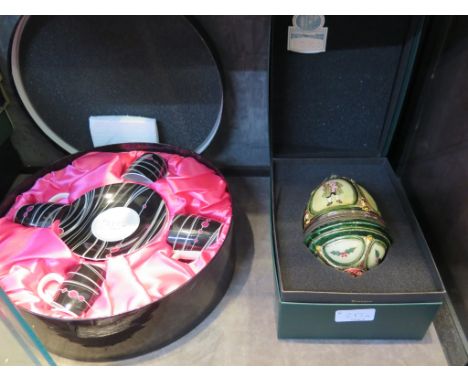 Four Royal Worcester Legends of the Nile series collectors plates, a Llewelyn-Bowen for Worcester coffee set and a Komozka ba