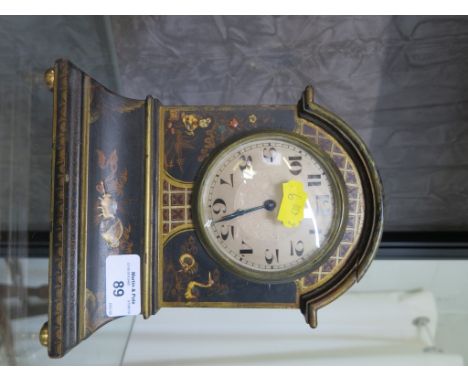 A 1920s blue lacquer mantel timepiece clock, with relief chinoserie decoration and silvered dial, with spring and balance whe