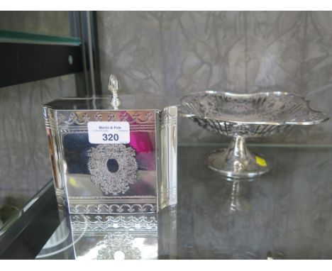 A fret cut design dish on stand, together with an Edzard silver plated tea caddy box