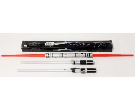 A collection of Star Wars collectables to include limited edition Anneka Skywalker light sabre umbrella, together with three 