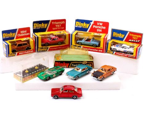 A tray containing a collection of mainly boxed Dinky Toys including No. 165 Ford Capri, No. 168 Ford Escort, No. 178 Mini Clu