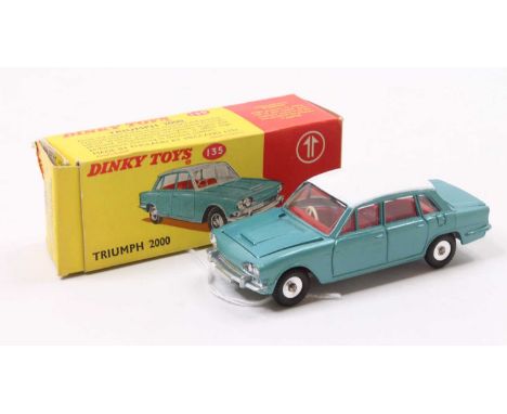 Dinky Toys No. 135 Triumph 2000 saloon comprising of metallic blue body with red interior and white roof with spun hubs and o