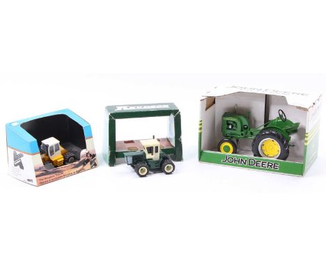 A collection of agricultural diecast vehicles to include a Valu-Cast Products model of a 1/64 scale Knudson tractor, a Valu-C