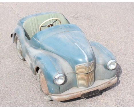 An original Austin J40 Pedal Car, finished in dark blue with chrome fixtures and fittings, complete with headlights, engine i