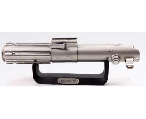 A Royal Selangor pewter limited edition collectable of Luke Skywalker's light sabre raised on display plinth