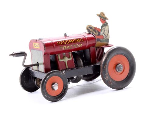 A circa 1920s Hess Mobil tractor, comprising of tinplate body with single fixed key, friction drive mechanism, complete with 