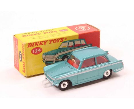 Dinky Toys, 134 Triumph Vitesse in aqua blue, red interior, one small blemish to roof, with complete box (NM-BNM)