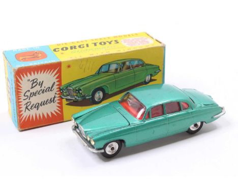 Corgi Toys No. 238 Jaguar MkX comprising of metallic sea green body with red interior and spun hubs, in the original all-card