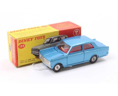 Dinky Toys No. 136 Vauxhall Viva comprising light metallic blue body, red interior and spun hubs, in the original red &amp; y