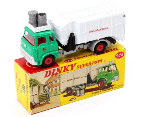 Dinky Toys No. 978 refuse wagon, comprising of green cab, black chassis and red hubs with grey back and grey roof rack, toget