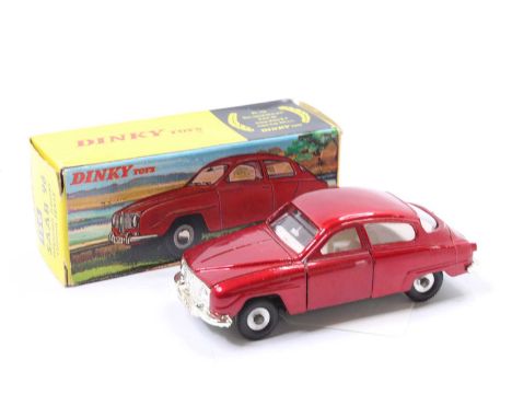 Dinky Toys No.156 Saab 96, metallic red with off white interior, chrome front and rear bumpers, spun hubs, in the original pi