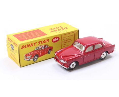 Dinky Toys No. 184 Volvo 122S comprising of red body with cream interior and spun hubs, housed in the original picture sided 