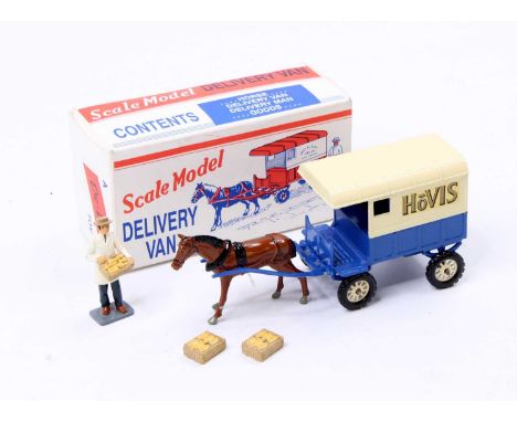 A De-Bo Toys scale model of a horse-drawn delivery van comprising a blue and cream wagon with "Hovis" livery, 2 bread baskets