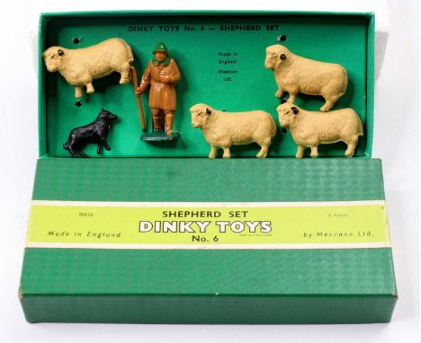 A Dinky Toys No. 6 shepherds gift set, comprising of shepherd, four lambs, and a sheep dog, housed in the original card tray 