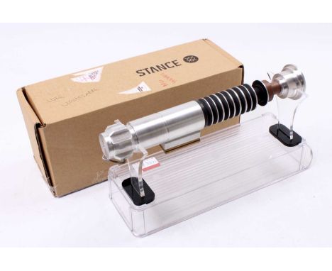A metal hand turned full size display model of Luke Skywalker's light sabre, housed on perspex display base, very well made b