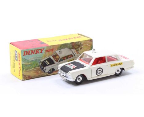 Dinky Toys No. 212 Ford Cortina Rally Car comprising of white and black body with red interior and spun hubs with various adv