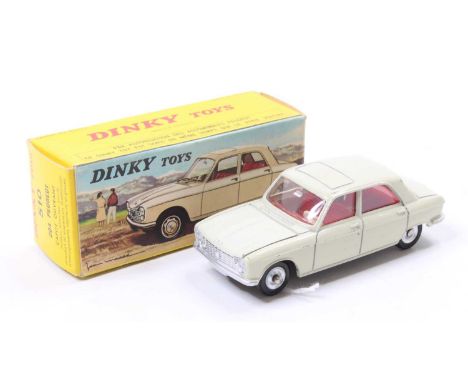 French Dinky Toys, 510 Peugeot 204, pale ivory body with red interior, concave hubs, in the original all-card yellow picture 