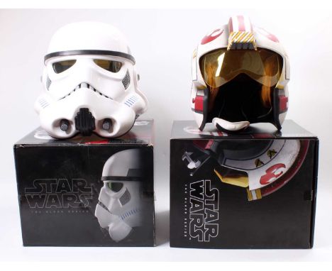 Star Wars The Black Series Boxed Helmet Group, to include Voice Changing Stormtrooper Helmet, and Luke Skywalker Battle Simul