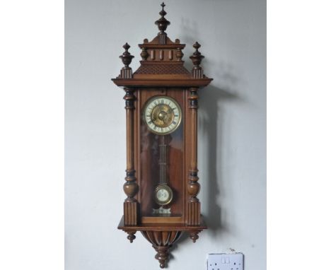 A Vienna Wall Clock, the clock with brass enamel face and Roman dial, approx 100 cms. (af)