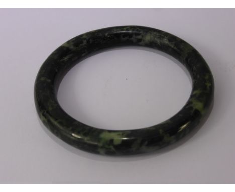 A Chinese Spinach Green Jade Bracelet, approx 50 gms.