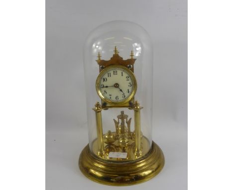 A Brass Twin Column Mantel Clock, with four weight pendulum, the clock having white enamel face with movement nr 160263, wt p
