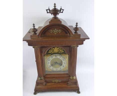 A Circa 1880 American Style Inlaid Wall Clock, the clock having carved deer finial with turned columns to side, filigree surr