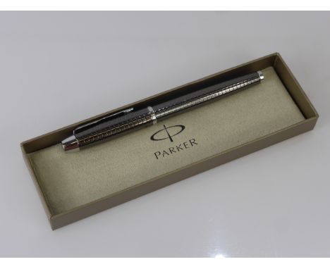 A Black Metal Parker Roller Ball Pen, in original box.