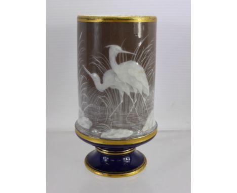 A 19th Century Pate-sur-Pate Vase, decorated with heron at the river side, approx 14 cms, with crossed swords to base, crosse