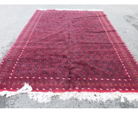 A Hand Knotted Afghan Baluch Carpet, approx 310 x 216 cms.