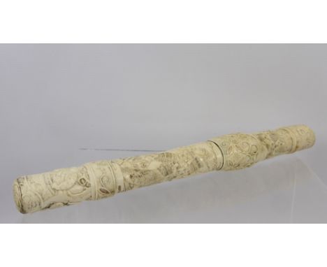 A 19th Century Japanese Meiji Period Ivory Tanto, the single tusk scabbard carved in low relief depicting Samurai and Taotie 