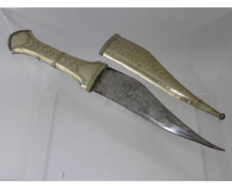 A Jordanian White Metal (Possibly Silver) Dagger, the blade is 12.5 cms, decorative wirework to both hilt and scabbard, total