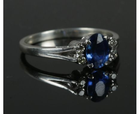 A white metal sapphire &amp; diamond ring, size M. 1.95g.  