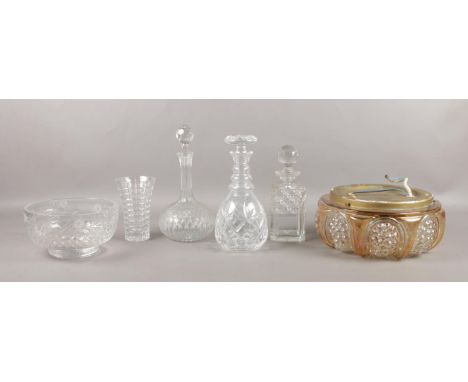 An assortment of glass ware. To include cut glass decanters, a glass flush ceiling light and Edinburgh crystal bowl etc.  