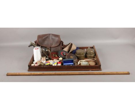 An oak butlers tray with an assortment of collectables. To include two Rabone Chesterman Ltd, vintage wind-up tape measures, 