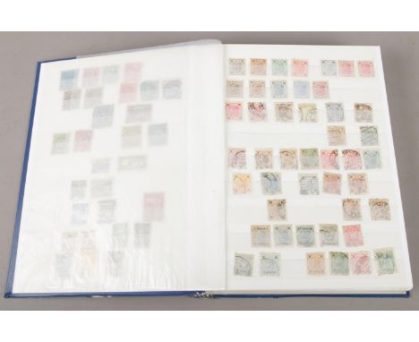An album of vintage European stamps.  