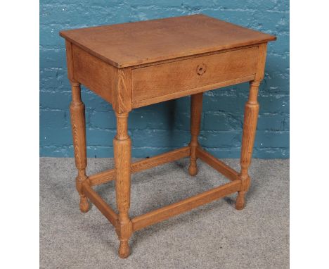 A light oak side table with drawer. (66cm x 56cm)  Missing handle.