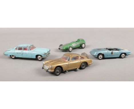 A collection of vintage Corgi die cast vehicles. Corgi Toys James Bond Aston Martin DB5, Lotus Elan S2, Jaguar Mark X Saloon 