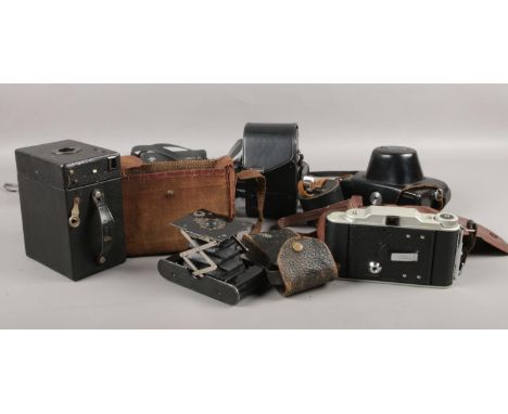 A quantity of camera's. Vintage Kodak Portrait Hawkeye No 2, Vintage Kodak ball bearing shutter camera (original case), Konic