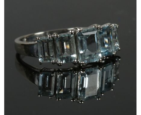 A 9ct white gold aquamarine 5 stone ring, size M. 2.42g.  