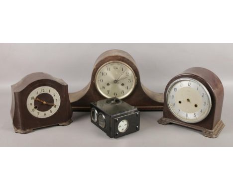 Three mantel clocks and a pigeon timing clock. Includes two bakelite examples, SkyMaster Ghost etc.  