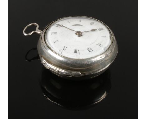 A silver pair cased pocket watch. With verge escapement, painted enamel dial with Roman numeral markers. Movement stamped for
