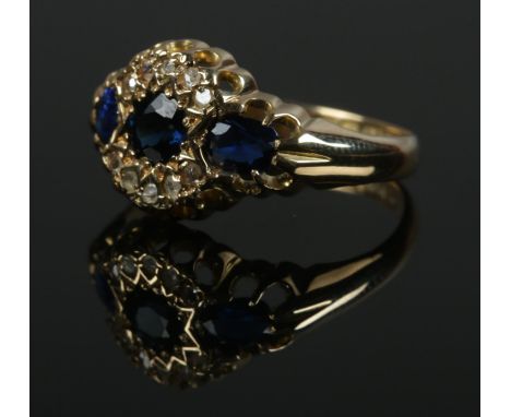 An early 20th century 18ct gold sapphire and diamond ring. Size N. 3.45g.  