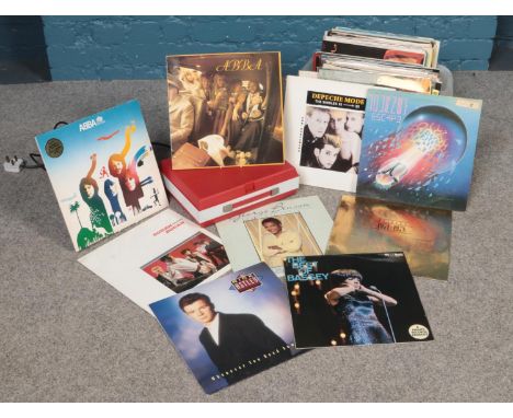 A Fidelity H.F.42 record player, together with a collection of vinyl records, including Depeche Mode, Duran Duran, Abba and T