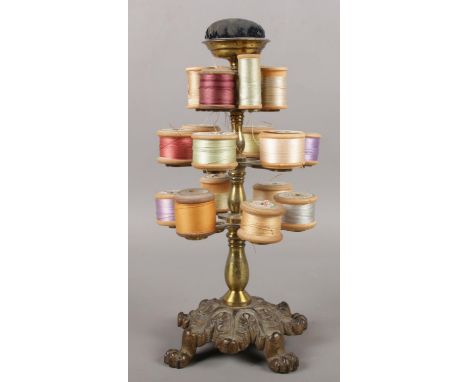 A vintage cast iron bobbin holder.  