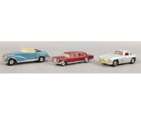 Three vintage Corgi vehicles. Mercedes Benz No. 300 SL, Mercedes Benz No. 600 Pullman, Mercedes Benz No. 300S.  