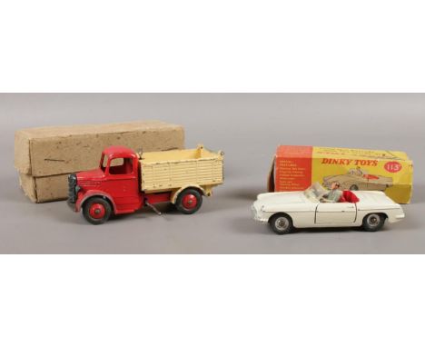 Two Dinky Toys vehicles. No. 25M Bedford end tipper truck, No 113 M. G. B sports car (boxed).  