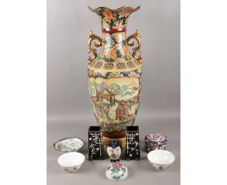 A collection of oriental ceramics, to include large decorative vase, lidded trinket dish and a pair of cuboid black glass vas