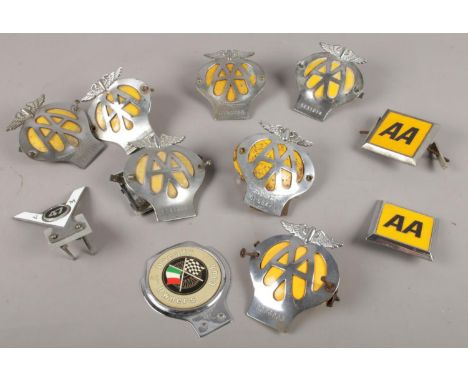 A collection of vintage car badges. To include AA, Ducati.  
